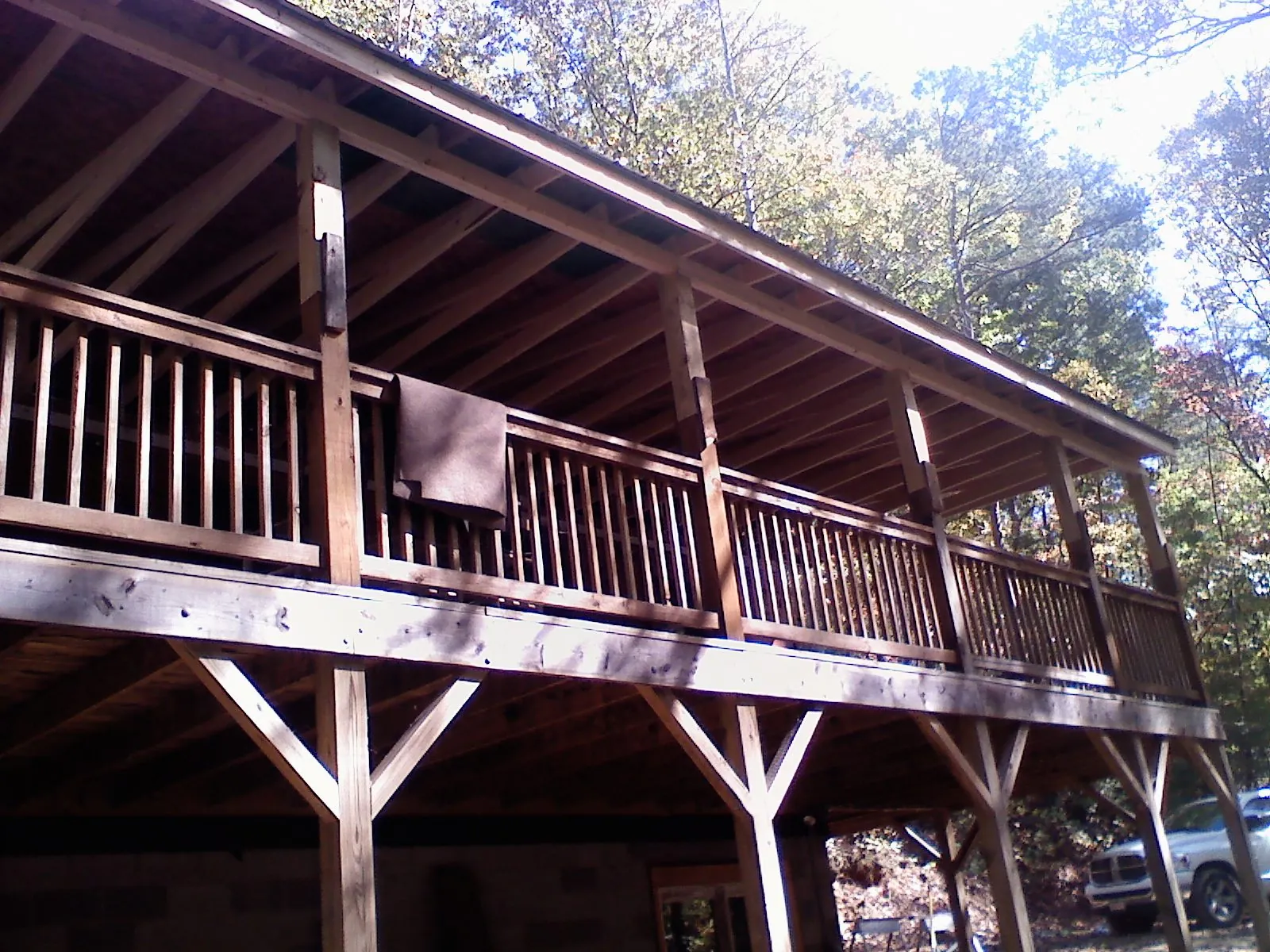 Timber framing under a new elevated porch and deck — Roof Leak Repair in Gordo by Roofing Brothers